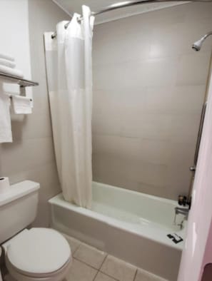 Bathtub, free toiletries, hair dryer, towels
