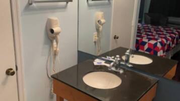 Bathtub, free toiletries, hair dryer, towels