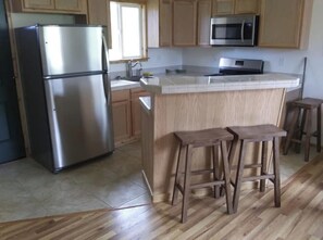 Fridge, oven, stovetop, coffee/tea maker