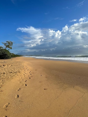 On the beach, white sand, beach towels