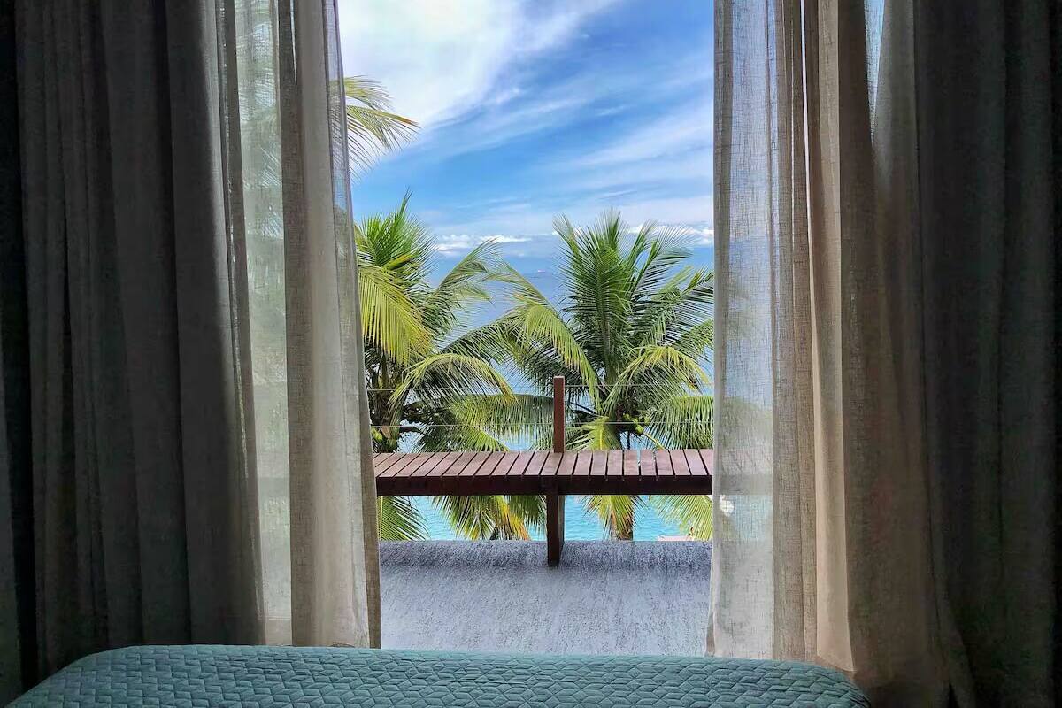 Kamar Double Deluks, pemandangan laut | Brankas, tirai kedap cahaya, Wi-Fi gratis, dan seprai linen