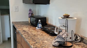 Fridge, microwave, coffee/tea maker, toaster
