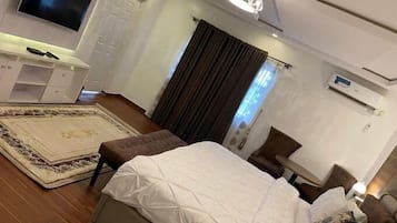 Family Apartment, Balcony, City View | 2 bedrooms, desk, laptop workspace, blackout drapes