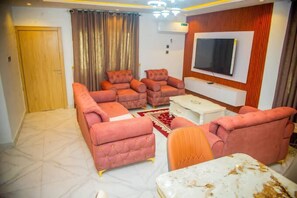 Family Apartment, Balcony, City View | Living area