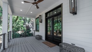 A covered porch with a ceiling fan, a welcome mat, and a metal basket. - 4 Bed/3.5 Bath! Pool! Amenity access included! Golf Course Views! (Seabrook Island)