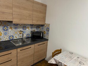 Fridge, microwave, electric kettle, coffee grinder