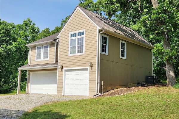 Welcome to Peaceful Pointe! Private drive take you to 9 acre get-a-way.