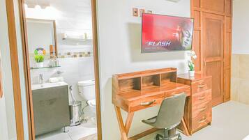 Deluxe Studio, Ground Floor | In-room safe, desk, laptop workspace, iron/ironing board