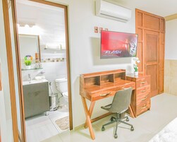 Deluxe Studio, Ground Floor | In-room safe, desk, laptop workspace, iron/ironing board