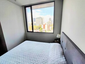 1 slaapkamer, een strijkplank/strijkijzer, reisbedje, gratis wifi