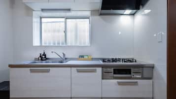Fridge, microwave, cookware/dishes/utensils