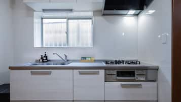 Fridge, microwave, cookware/dishes/utensils
