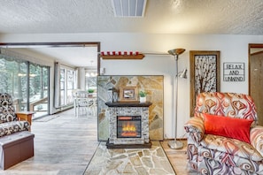 Smart TV, fireplace, DVD player, books