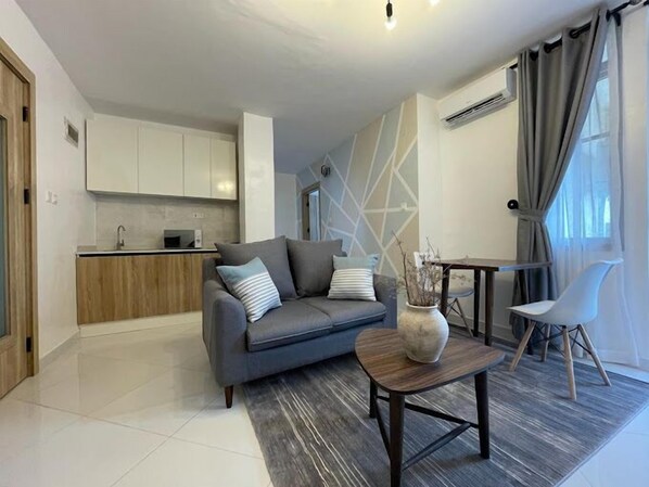 Economy Apartment, Balcony, City View | Living area - Lavish Apartment (Abuja)