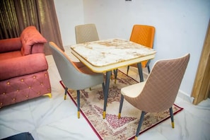 Economy Apartment, Balcony, City View | Living area - Lavish Apartment (Abuja)