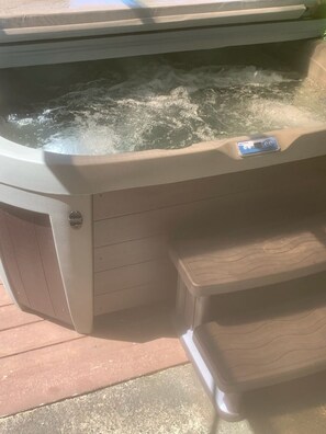 A hot tub with a control panel and a card reader. - Yonegan Maui Getaways - Haiku - Unit 4 (Haiku)