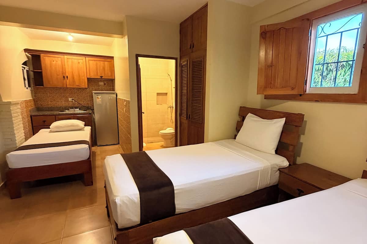 Room, Multiple Beds, Non Smoking, Air conditioning | Desk, laptop workspace, blackout drapes, iron/ironing board (on request)