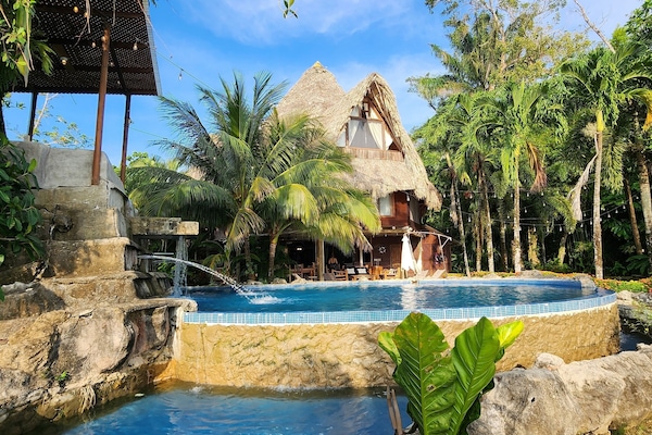 Outdoor pool, open 8:00 AM to 9:00 PM, pool umbrellas