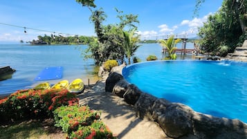 Outdoor pool, open 8:00 AM to 9:00 PM, pool umbrellas