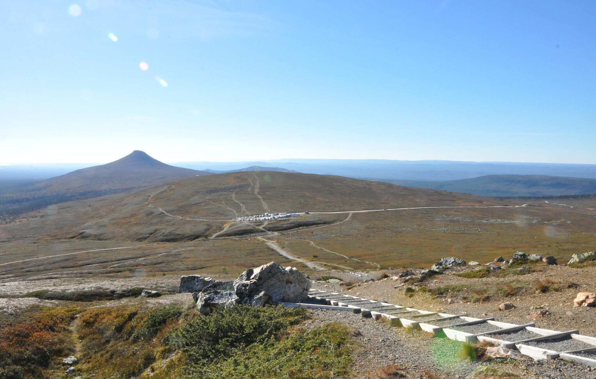 A mountainous landscape with a clear sky.