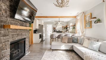 Smart TV, fireplace, DVD player, books