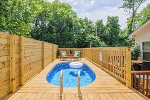 A wooden deck with a hot tub, surrounded by a wooden fence and trees. - 50% Off! Venetian Spa | Hot Tub & Pool & Sauna (Charlotte)