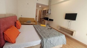 1 chambre, coffres-forts dans les chambres, fer et planche à repasser