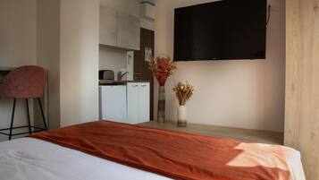 2 habitaciones, tabla de planchar con plancha, wifi y ropa de cama