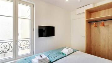 2 habitaciones, tabla de planchar con plancha, wifi y ropa de cama