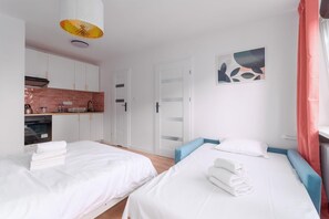 1 chambre, fer et planche Ă repasser, Wi-Fi, draps fournis