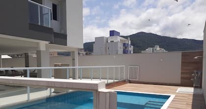 High Standard 2 Bedrooms 2 Bathrooms 2 Parking Spaces Pool WiFi AC Smart TV Network Balcony Gourmet