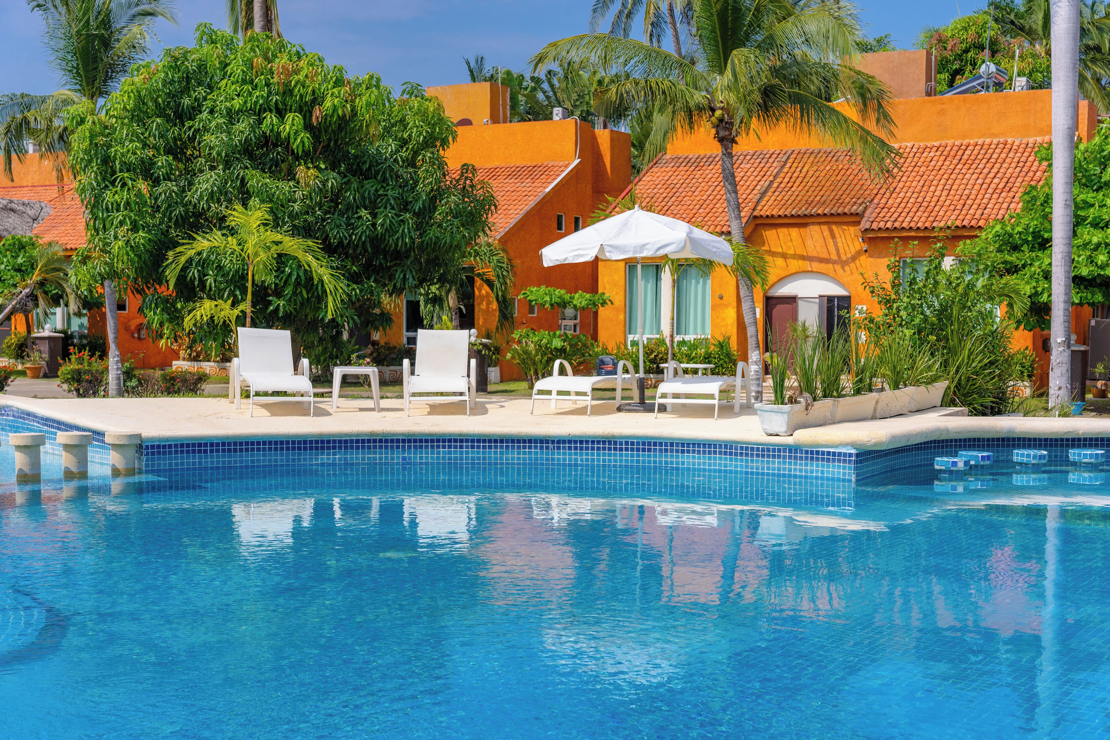 Outdoor pool, open 8:00 AM to 10:00 PM, pool umbrellas, sun loungers