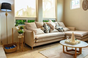 Superior House, Garden View | Living room | TV