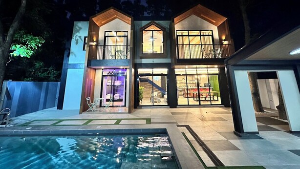 A two-story house with a swimming pool in front. - Fabulous 3-bedroom Private Villa in Lubao Pampanga with plunge pool (Lubao Pampanga)