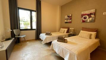 2 slaapkamers, een strijkplank/strijkijzer, gratis wifi, beddengoed