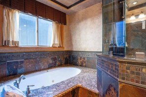 Shower, hair dryer, towels, shampoo