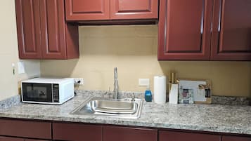 Fridge, microwave, coffee/tea maker, toaster