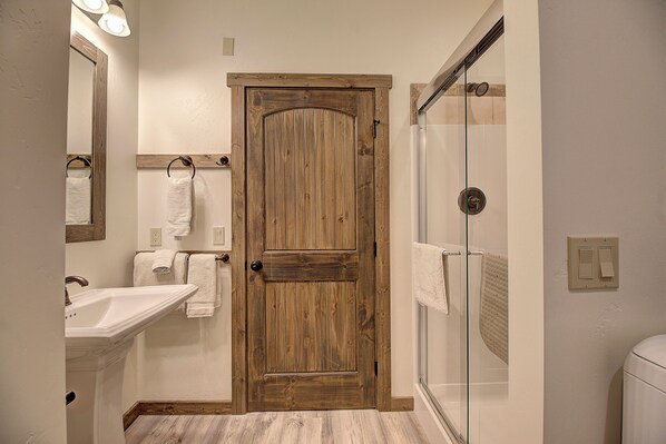 Shower, eco-friendly toiletries, hair dryer, towels