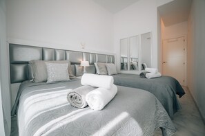 2 bedrooms, desk, iron/ironing board, travel crib