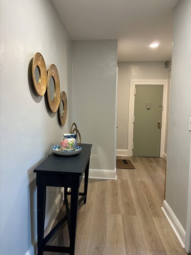 A charming comfy apartment with bright lights and lots of sunlight. 