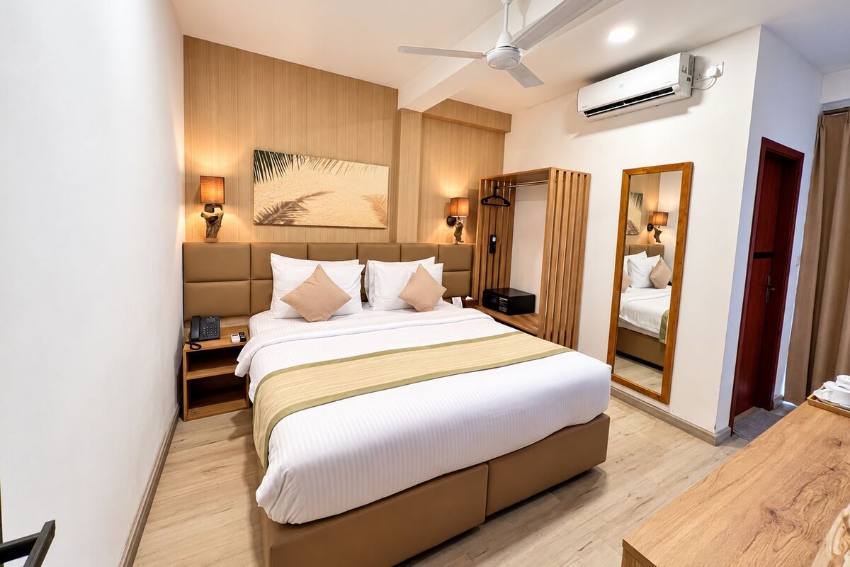 Premium bedding, down duvets, memory-foam beds, in-room safe