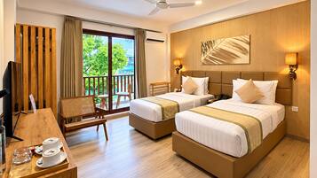 Premium bedding, down duvets, memory-foam beds, in-room safe