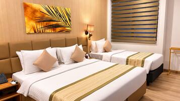 Premium bedding, down duvets, memory-foam beds, in-room safe