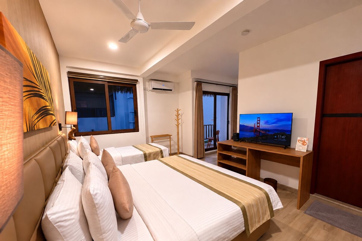 Premium bedding, down duvets, memory-foam beds, in-room safe