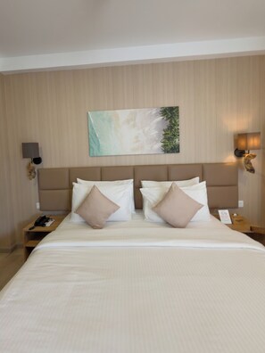 Deluxe Double Room with Private Balcony | Premium bedding, down duvets, memory-foam beds, in-room safe - Cocomo Maldives (Himmafushi)