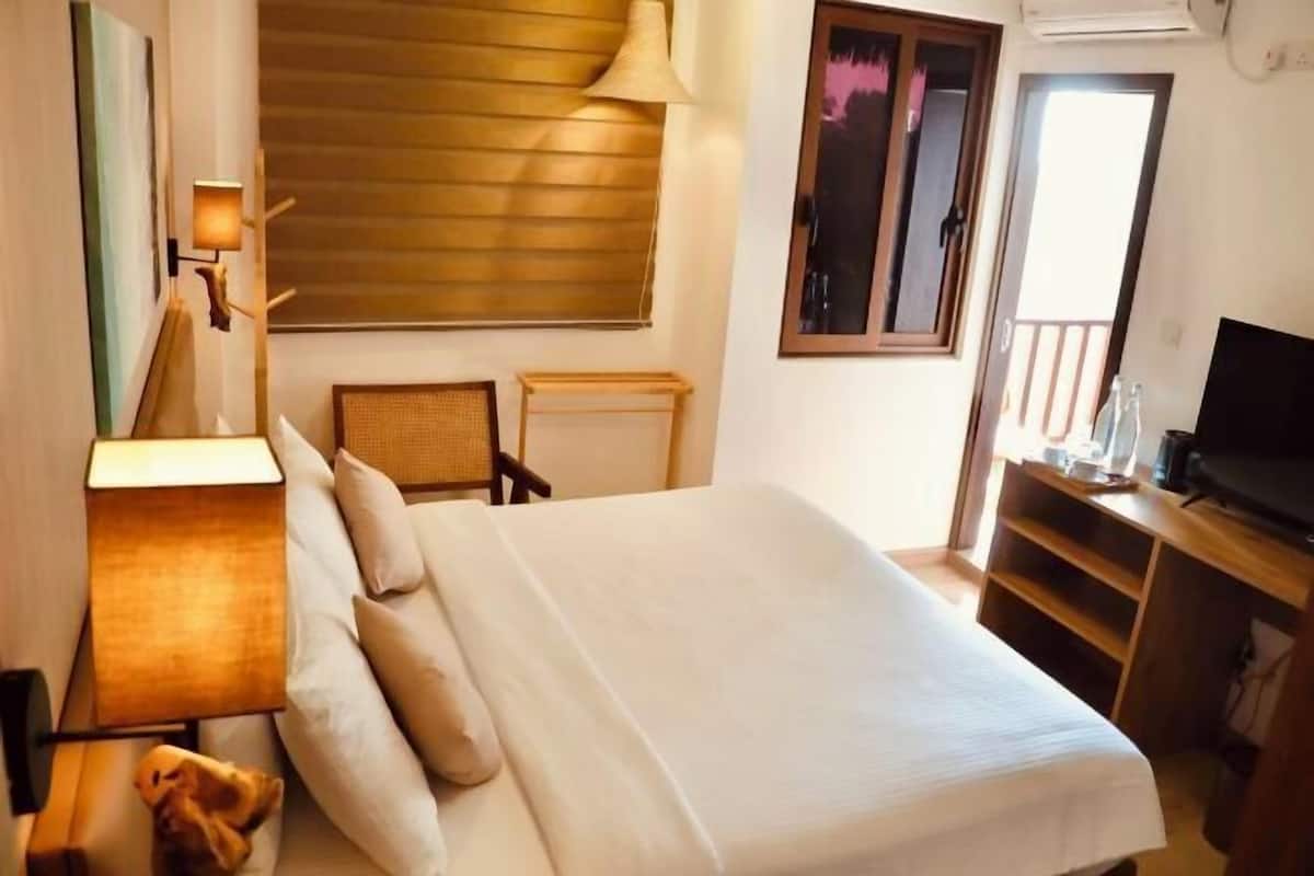 Premium bedding, down duvets, memory-foam beds, in-room safe