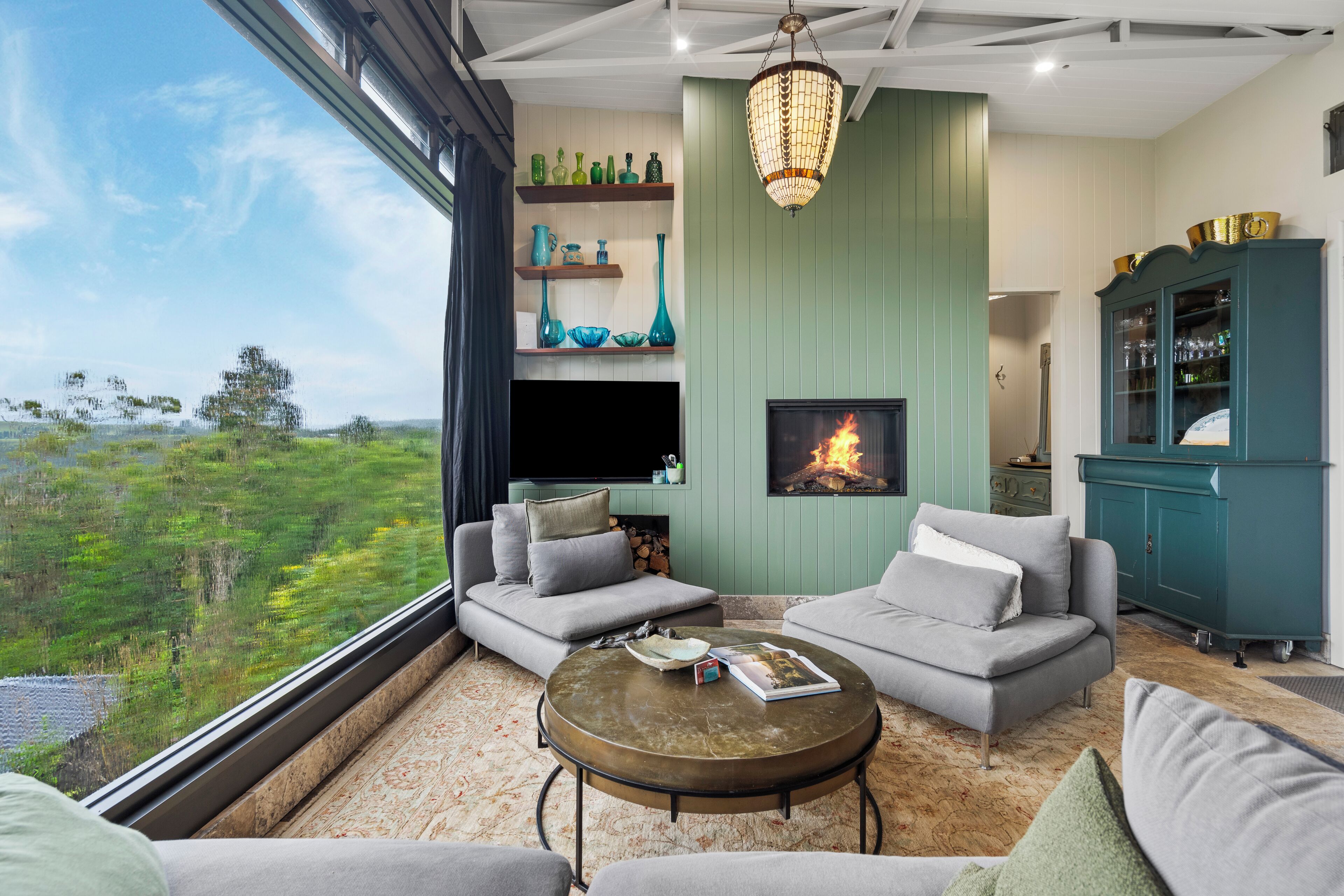 Smart TV, fireplace, books