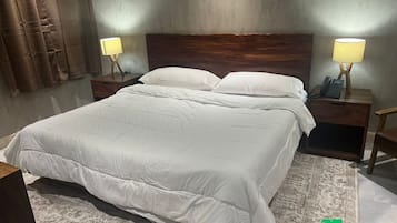 Luxury Suite, Golf View | In-room safe, desk, laptop workspace, soundproofing