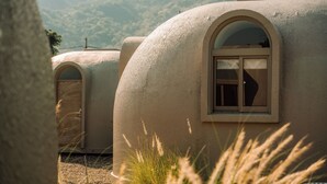 A spherical, dome-shaped building with a window and a door. - BOHOLAND (Zhushan)
