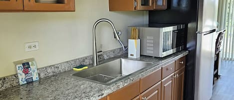 Fridge, microwave, coffee/tea maker, toaster